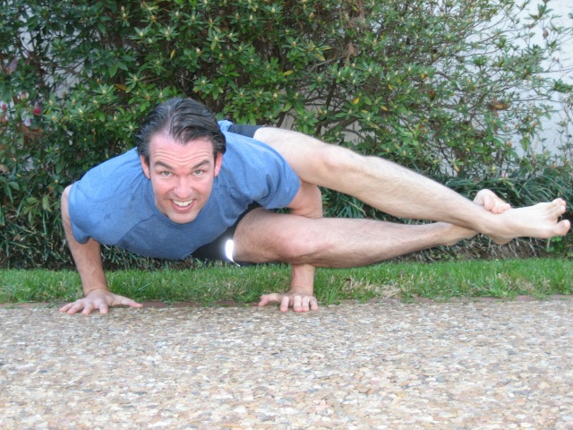 Dr. Jason Hall doing yoga