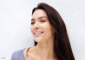 Dark haired woman smiling