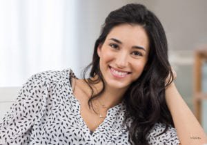 Brunette female Plastic Surgery patient smiling